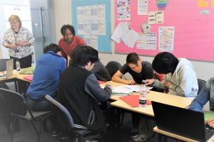 Teen English founder teaches an Academic English class